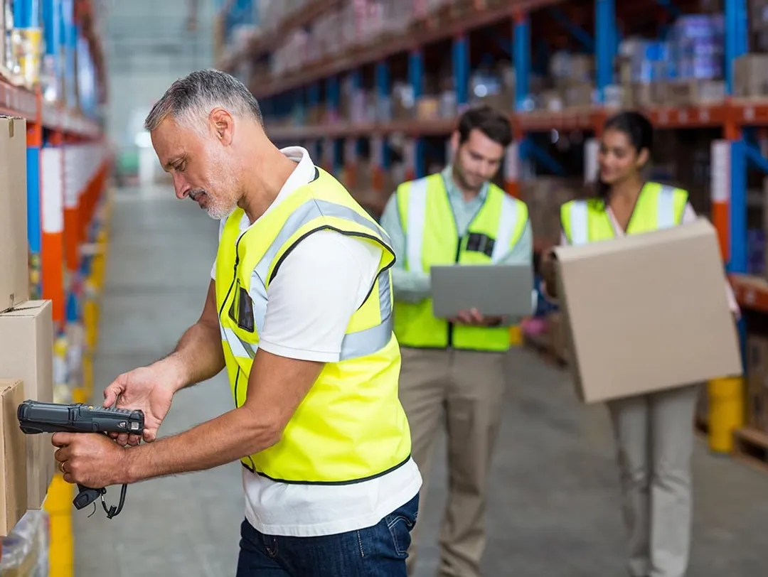 Photo of workers in a warehouse